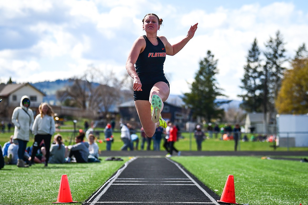 Flathead's Afton Wride competes in the girls long jump at Legends Stadium on Tuesday, April 16. (Casey Kreider/Daily Inter Lake)