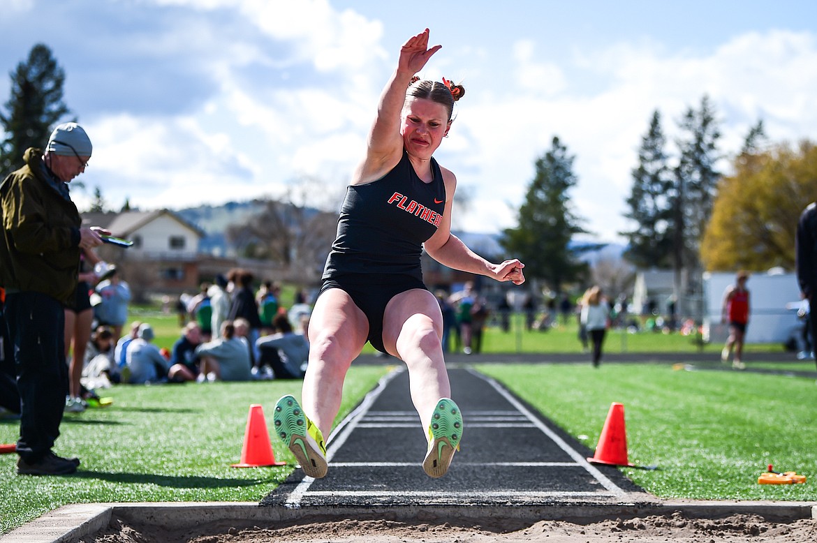 Flathead's Afton Wride competes in the girls long jump at Legends Stadium on Tuesday, April 16. (Casey Kreider/Daily Inter Lake)