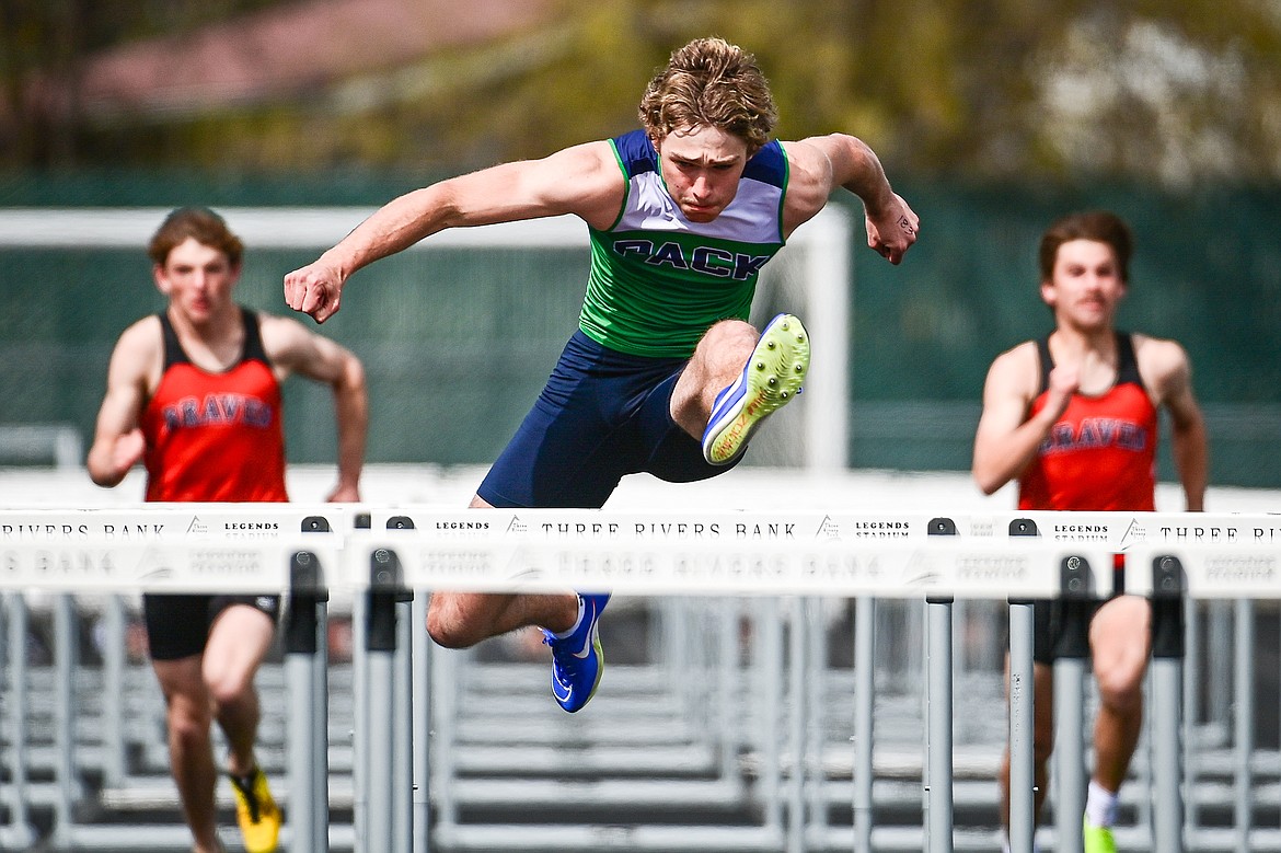 Glacier's Ethan Anderson clears a hurdle during the boys 110 meter hurdles at Legends Stadium on Tuesday, April 16. (Casey Kreider/Daily Inter Lake)