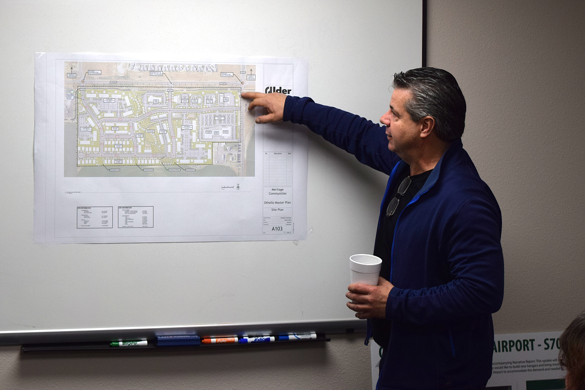 Meritage Companies President Jack Barrett shows a preliminary design of Meritage’s potential development on 75 acres of land southwest of the intersection of state Route 26 and South 14th Avenue.