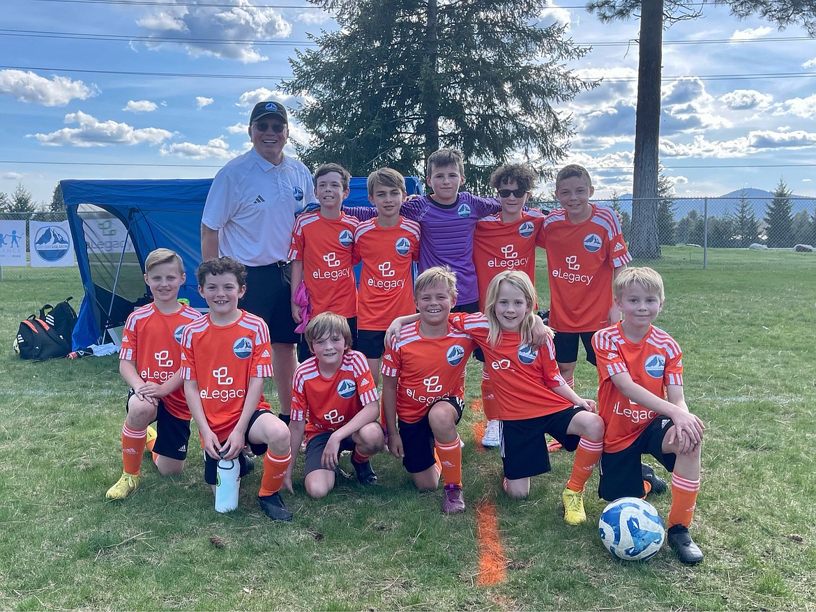 Courtesy photo
The NIFC Avalanche Orange team moved up to the Washington Inland Premier League as well, the most competitive level of youth soccer in the Northwest. The Orange team won 2-1 against Surf White Moore B14 at Plants Ferry in Spokane on Saturday. In the front row from left are Maverick Paine, Luke Johnson, Ezra Herzog, Jett Crandall, Stein Berk and Isaac Estep; and back row from left, coach John O’Neil, Jack Harrison, Luca Riley, Davis Hartley, Graysen Higgins and Collin Pinchuk.
