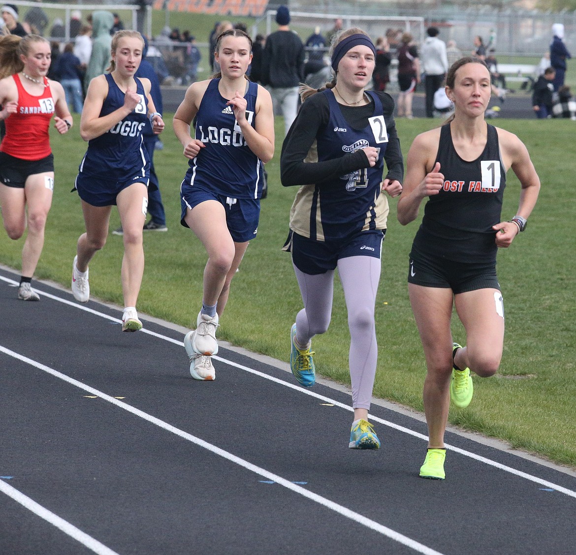 JASON ELLIOTT/Press
Post Falls junior Kaylynn Misner takes the lead on Timberlake sophomore Vanessa McLachlan during the first lap of the girls 1,600-meter run at the Christina Finney Coed Relays on Tuesday at Post Falls High.