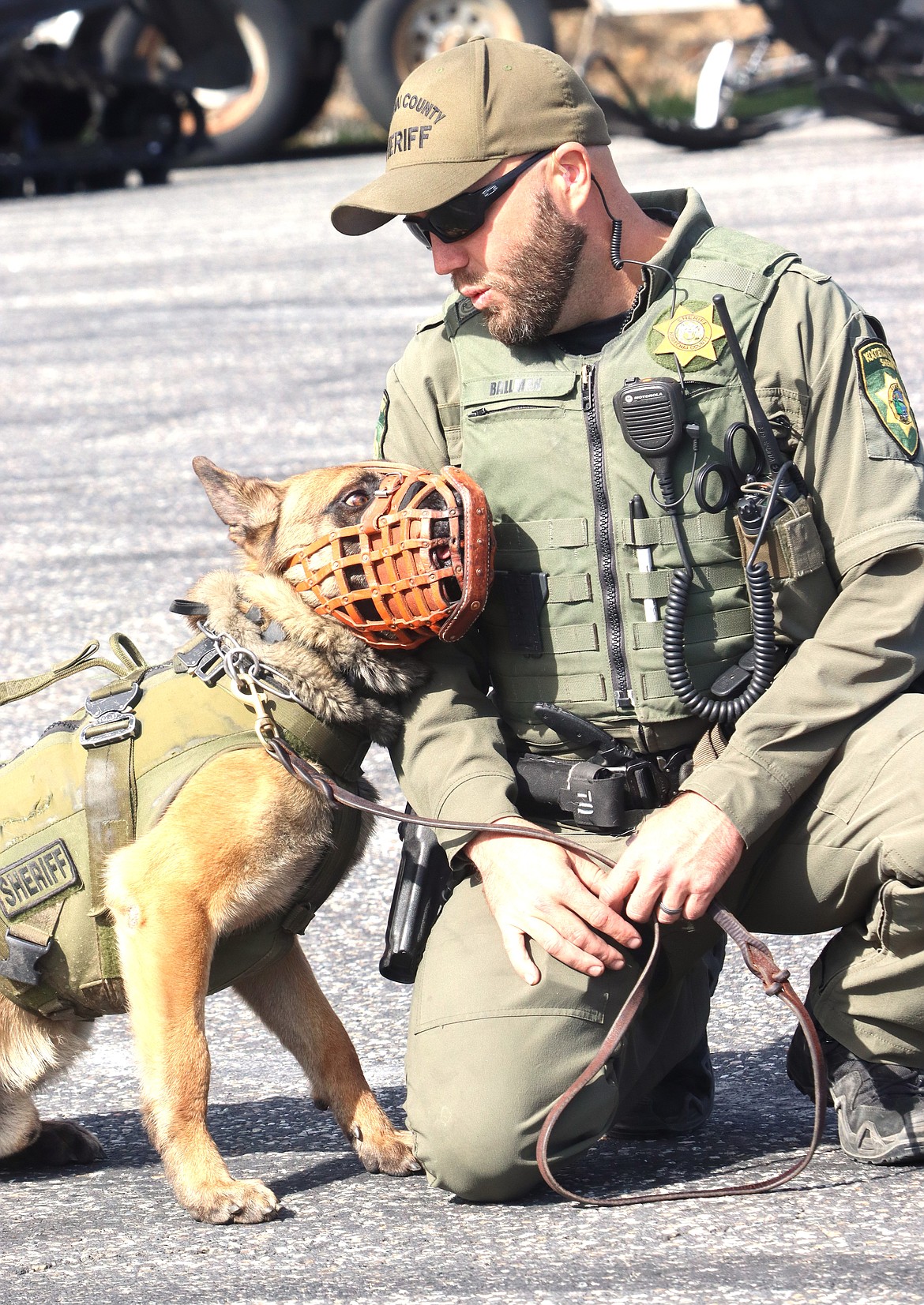 KCSO Deputy Harvey Ballman and Appa, a Belgian Malinois, share a moment at Higgens Point on Tuesday.