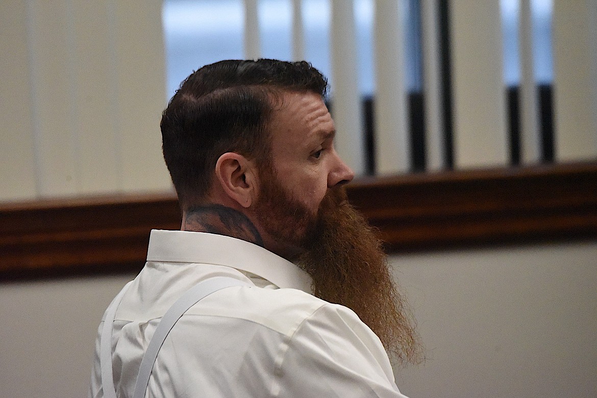 Jason Miller sits at the defense table while waiting for his trial to begin Wednesday, April 17, 2024, in the Lincoln County Courthouse. Miller is accused of attempted deliberate homicide for his alleged involvement in running over Montana Highway Patrol Trooper Lewis Johnson on Feb. 16, 2023, near Koocanusa Dam. (Scott Shindledecker/The Western News)