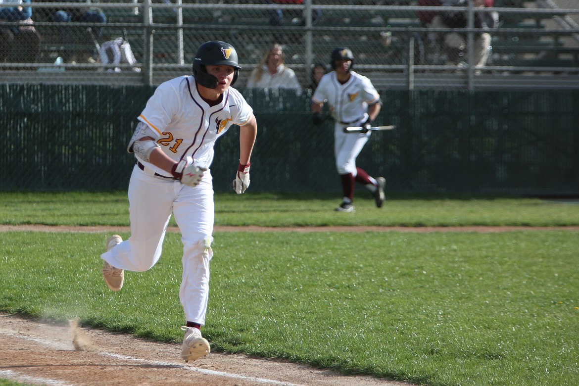 Moses Lake freshman Jacoby Fulbright dashes to first base after making contact with a pitch. Fulbright led the Mavs with two RBI in Tuesday’s win.