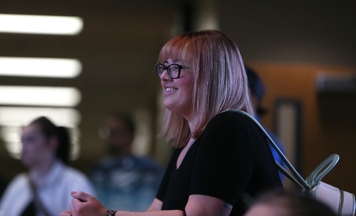 Ari Boesen of Coeur d'Alene smiles as she reacts to a panel discussion Tuesday during the inaugural Women at Work event presented by North Idaho College.