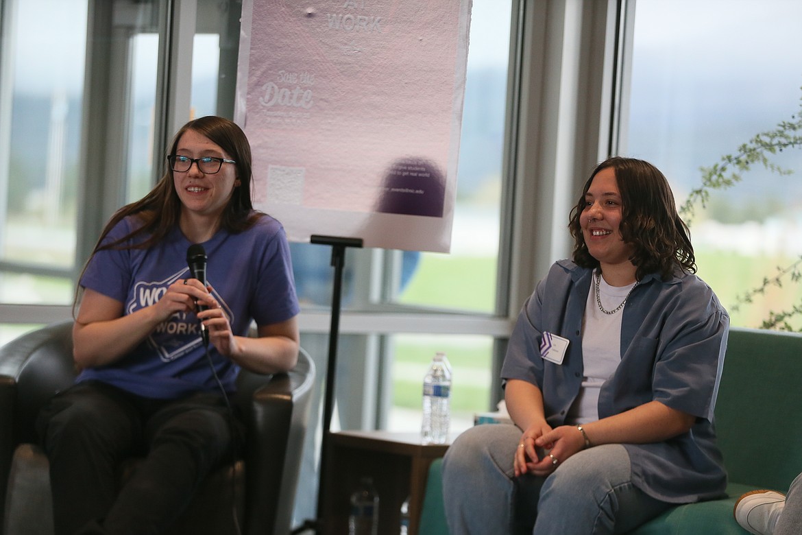 Morgan Doney, left, and Lila Nosler discuss what they enjoy about their trades programs Tuesday during North Idaho College's first Women at Work event, held at the Parker Technical Education Center. Doney is in machining and CNC technology at NIC. Nosler is a Post Falls High student who is dual-enrolled at NIC and is in the auto body collision and repair program at Kootenai Technical Education Campus.