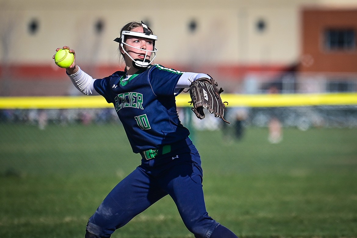 Glacier's Olivia Warriner (10) throws to first for an out after fielding a grounder against Flathead at Glacier High School on Thursday, April 18. (Casey Kreider/Daily Inter Lake)