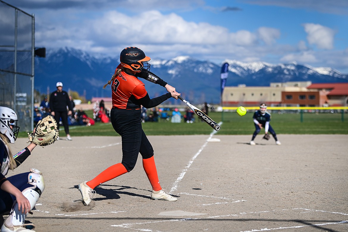 Flathead's Macey McIlhargey (3) connects on a double in the first inning against Glacier at Glacier High School on Thursday, April 18. (Casey Kreider/Daily Inter Lake)