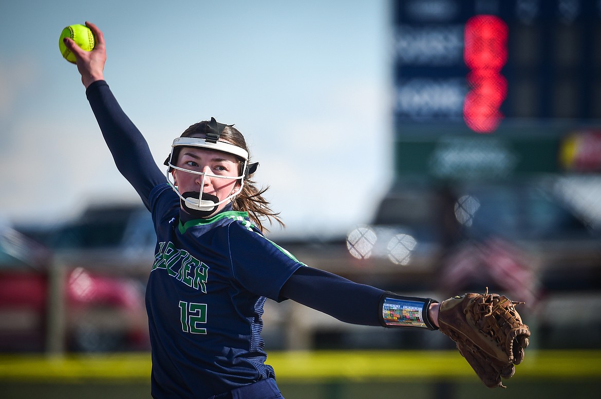Glacier's Ella Farrell (12) delivers in the second inning against Flathead at Glacier High School on Thursday, April 18. (Casey Kreider/Daily Inter Lake)