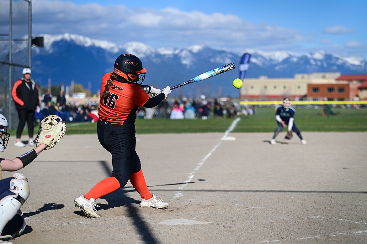 Flathead's Olivia Nyman (16) connects on a hit in the fourth inning against Glacier at Glacier High School on Thursday, April 18. (Casey Kreider/Daily Inter Lake)