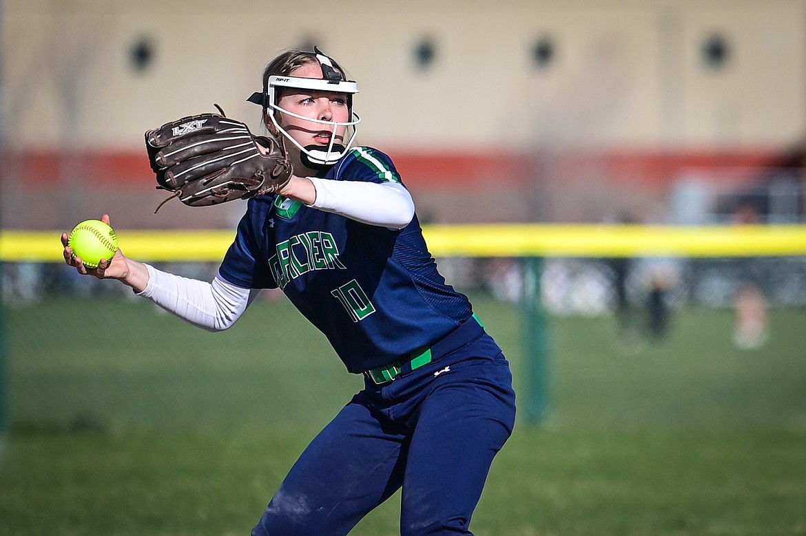 Glacier's Olivia Warriner (10) throws to first for an out after fielding a grounder against Flathead at Glacier High School on Thursday, April 18. (Casey Kreider/Daily Inter Lake)