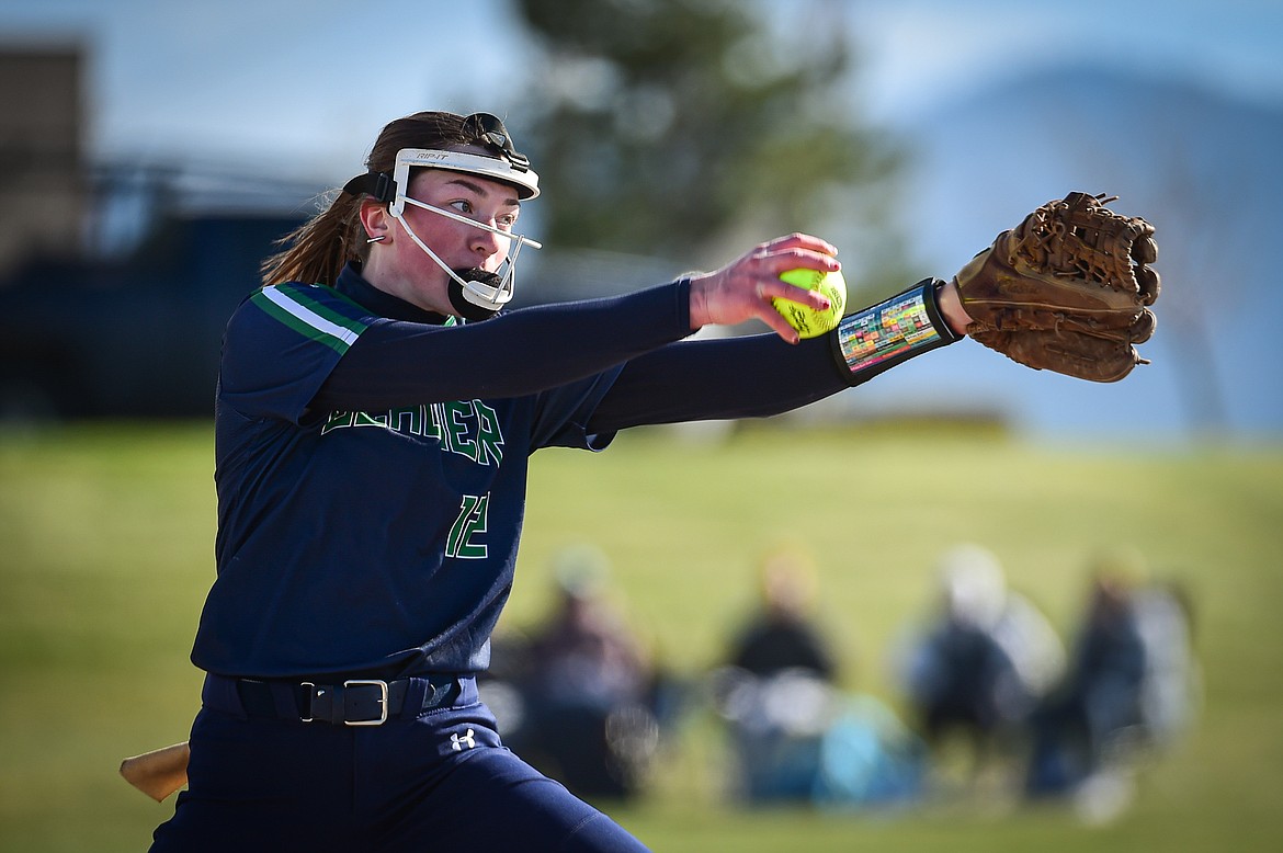 Glacier's Ella Farrell (12) delivers in the second inning against Flathead at Glacier High School on Thursday, April 18. (Casey Kreider/Daily Inter Lake)