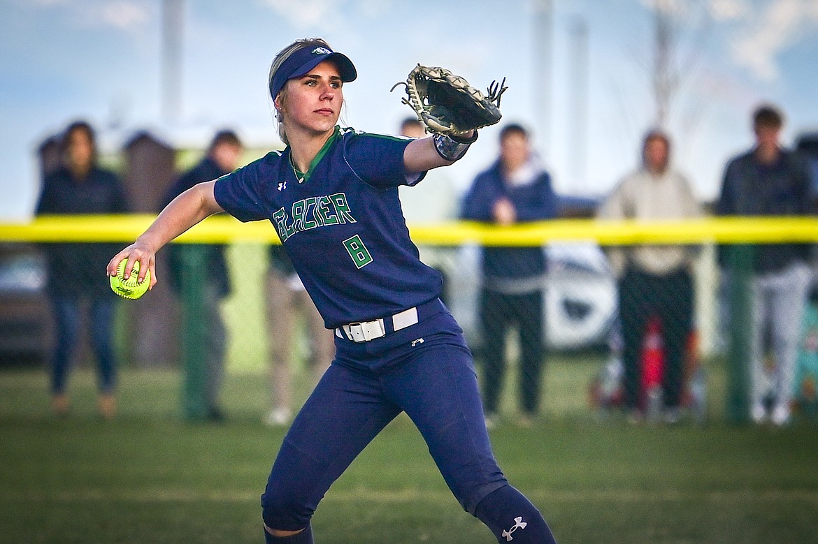 Glacier shortstop Nakiah Persinger (8) throws to first for an out after fielding a grounder against Flathead at Glacier High School on Thursday, April 18. (Casey Kreider/Daily Inter Lake)