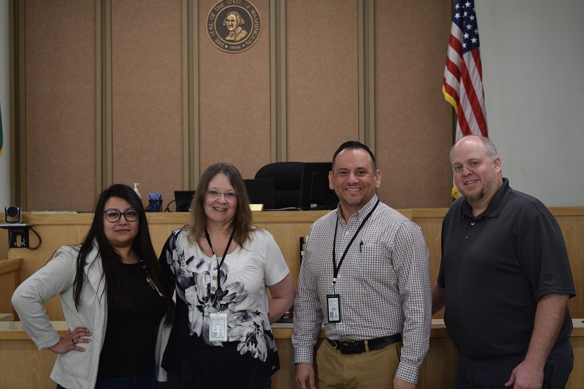 From left to right: Community Court Specialist Alma Farias, Community Court Coordinator Amy Paynter, Community Court Specialist Manny Garcia and District Court Judge Brian Gwinn. Not pictured are representatives of the Prosecutor's Office and Public Defender's Office.