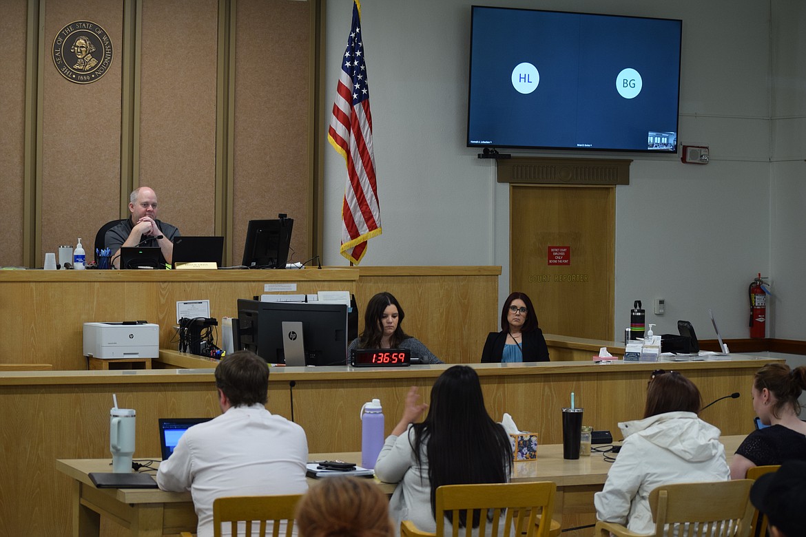 District Court Judge Brian Gwinn oversees a session of Grant County Community Court on April 10. The program works to rehabilitate habitual offenders struggling with addiction or other difficult issues lead to poor decisions.