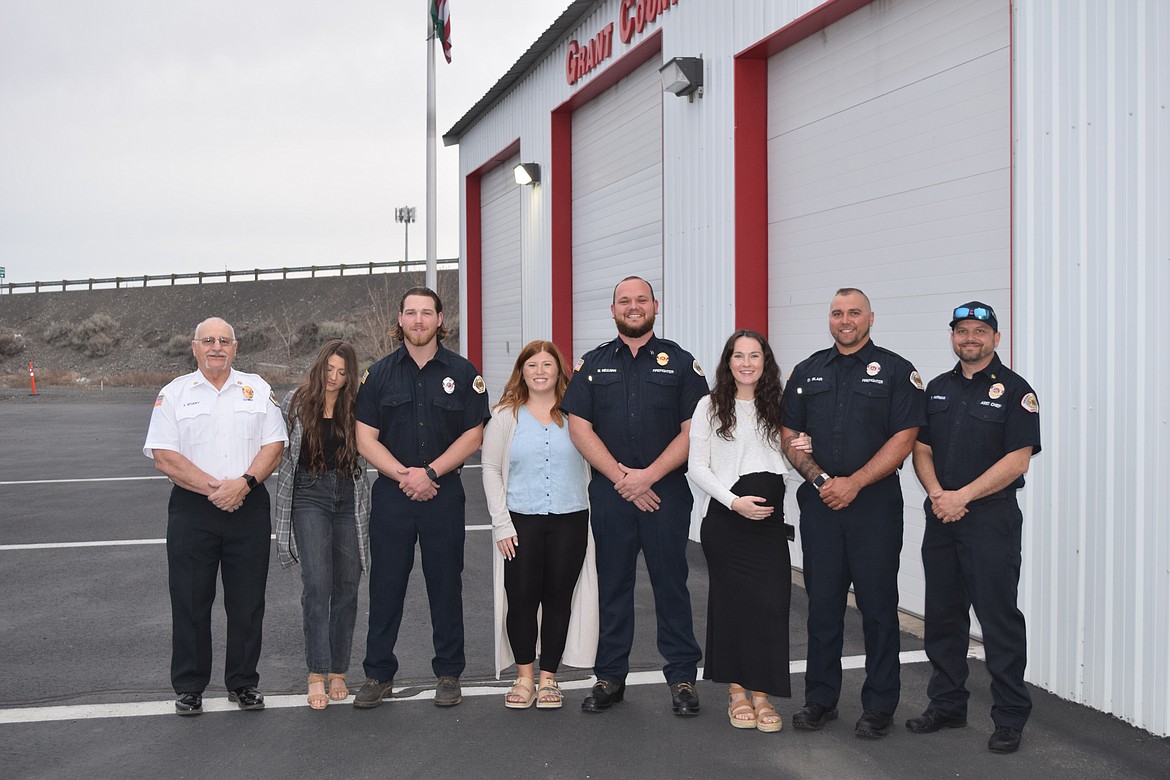 From left to right: Grant County Fire District 13 Fire Chief Jim Stuckey, Hannah De Hoog, Cpt. Justin De Hoog, Devin Elvin, Battalion Chief Mathew Meulman, Amy Blair, Cpt. Dakota Blair and Assistant Chief Todd Huffman during last week’s promotion ceremony at the fire station.