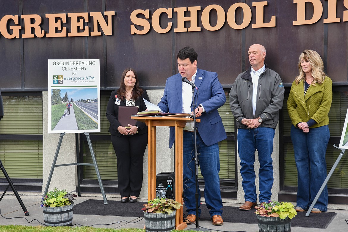Rep. Tony Brockman, R-Evergreen, speaks at a groundbreaking ceremony for the creation of sidewalks in Evergreen along U.S. 2 on April 18, 2024. During the 2023 Legislative session, Brockman introduced legislation to create these sidewalks. (Kate Heston/Daily Inter Lake)