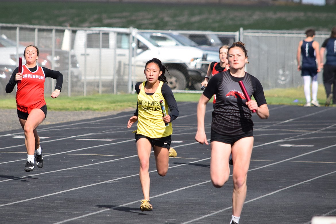 Lind-Ritzville relay runner Saige Galbreath competes in the 4x400-meter relay race during Wednesday’s track meet at Lind-Ritzville High School.