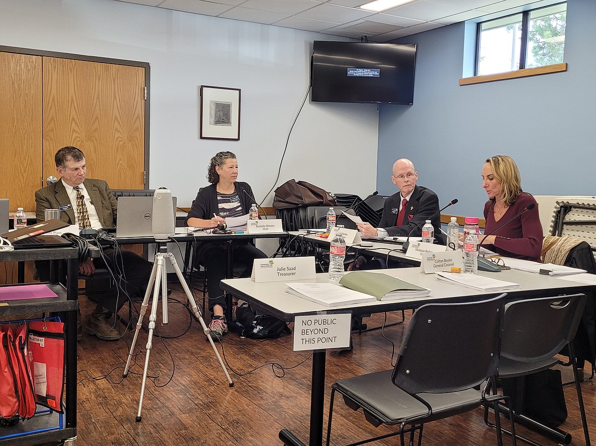 From left, Trustees Tim Plass, Rachelle Ottosen, Tom Hanley and Vanessa Robinson discuss Community Library Network business Thursday during a regular meeting at the Hayden Library.