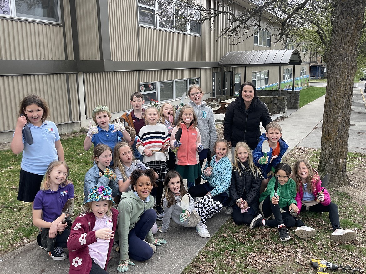 Third-graders in the Kindness 101 Club at Sorensen Magnet School worked hard to plant more than 200 bulbs around the school Tuesday.
Front left to right: Vivian Schwartz, Sunny Monteith, Felicity Cofer, Kennedy Tierney, Hatty Lemmon, Finley Matheson and Eloise Carper
Second left to right: Octavia Trautvetter, Charlie Gabriel, Lucille Thomas and Marcus Weinberger
Back left to right: Oceana Stewart-Bryan, Brighton Shute, Dante Curry, Sage Lauri, Evie Chambers, Delilah Hinks, Sloan Rayner and Abby Fremouw