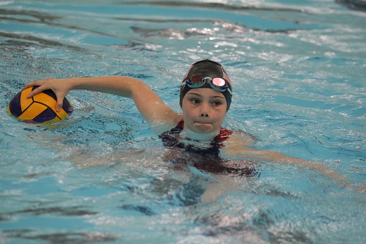 JASON ELLIOTT/Press
Charlie Lindsay, a student at Fernan STEM Academy, swims toward the goal during a North Idaho Water Polo Club team practice at the Kroc Center in Coeur d'Alene on Wednesday.