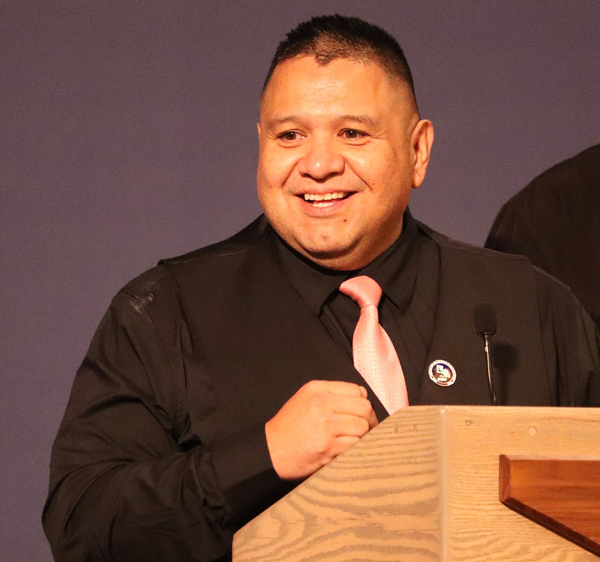 Chief Allan, chairman of the Coeur d'Alene Tribe, smiles during the Coeur d’Alene Regional Chamber’s annual student scholarship breakfast at The Coeur d’Alene Resort on Friday.