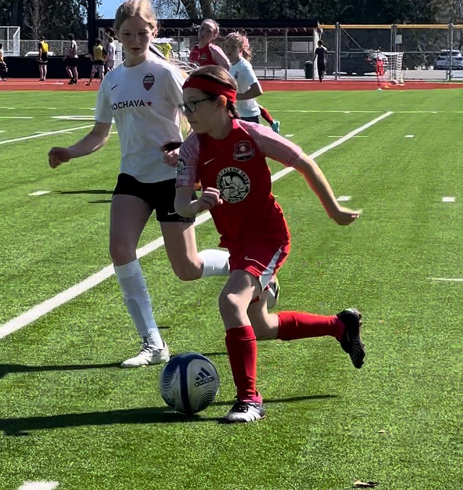 Photo by JULIE SPEELMAN
Victoire James of the Thorns North FC 12 girls soccer team dribbles down the field in a recent game against the Sandpoint Strikers FC in Sandpoint. The game ended in a 1-1 tie, with Elle Sousley scoring for the Thorns.