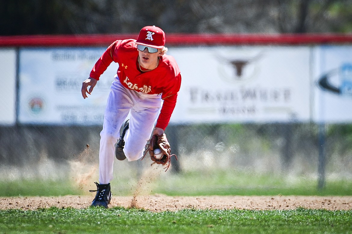 Lakers AA shortstop Kaden Drish (6) scoops up a grounder against the Cranbrook Bandits at Griffin Field on Saturday, April 20. (Casey Kreider/Daily Inter Lake)