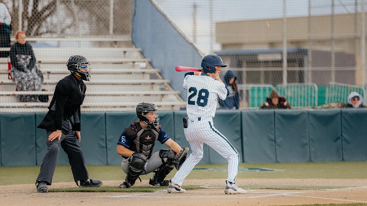 Big Bend catcher Blaine Macdonald (28) stands in the batter’s box awaiting a pitch.