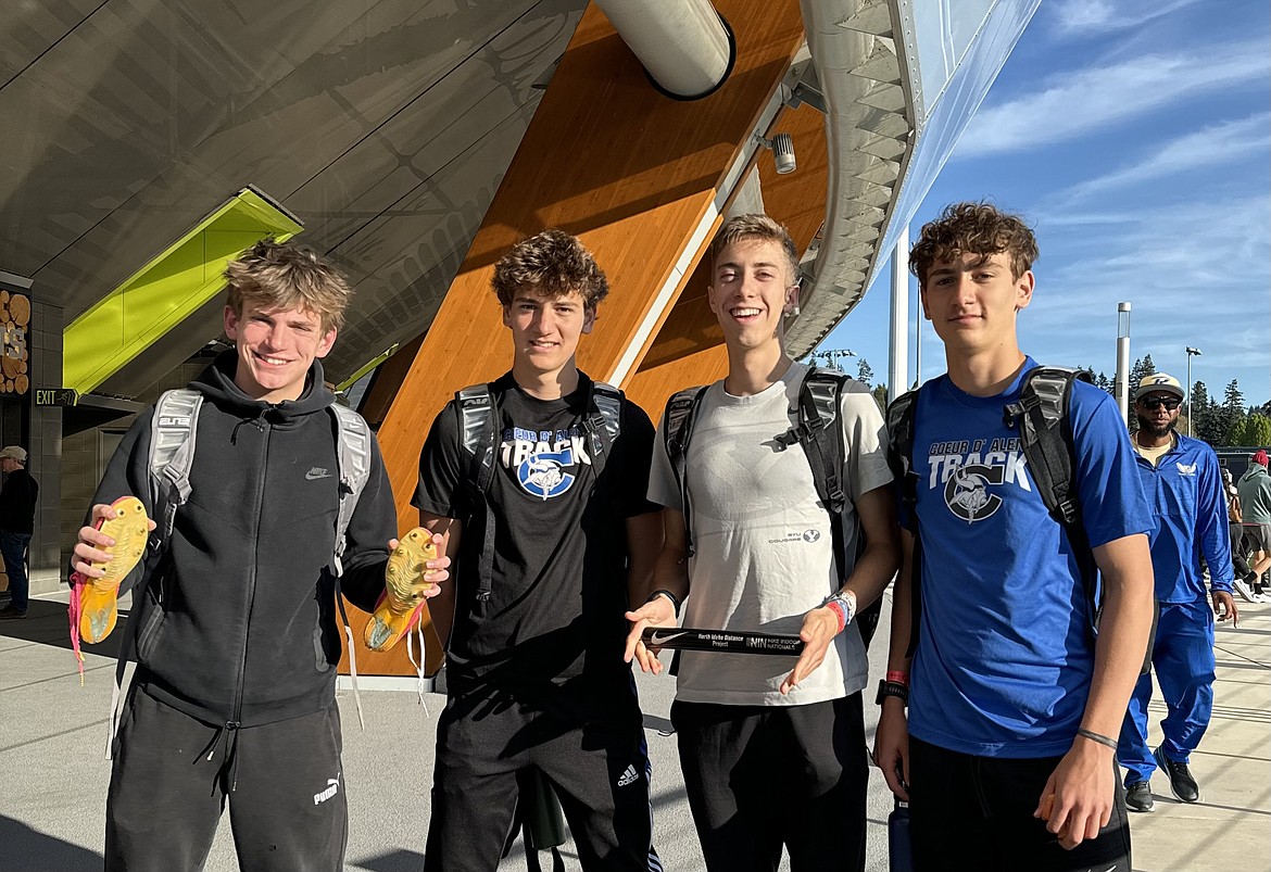 Courtesy photo
Coeur d'Alene's boys placed fifth in the Championship Distance Medley Relay with a team time of 10:15.29 at the Oregon Relays, held Friday and Saturday at Hayward Field in Eugene, Ore. From left are Lachlan May, Zack Cervi-Skinner, Jacob King and Max Cervi-Skinner.
Other Coeur d'Alene results (combined heats):
Boys Mile: CHS Junior Max Cervi-Skinner 14th (4:17.83), freshman Wyatt Carr 22nd (4:21.07 PR), Junior Zack Cervi-Skinner 26th (4:22.66) and senior Jacob King 35th (4:27.33).
Girls Open Mile: Coeur d'Alene Charter sophomore Annabelle Carr 18th (5:05.01 PR) and CHS sophomore Olivia May 53rd (5:24.16)
Girls Open 800m: Charter Annabelle Carr 29th (2:20.02)
Boys Open 800m: CHS senior Lachlan May in 28th (1:58.51 SB)