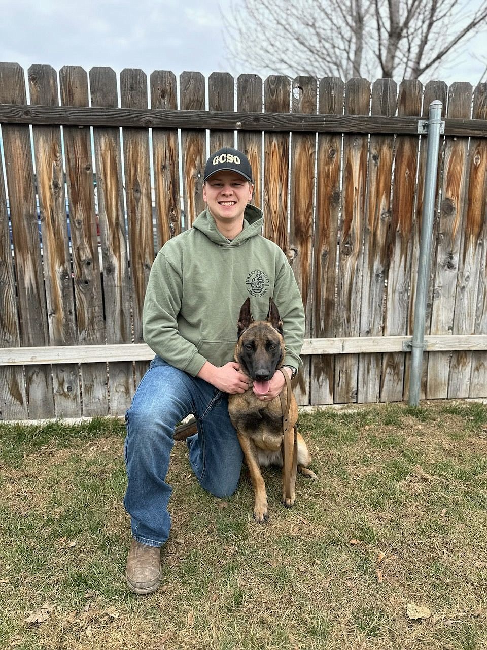 K9 handler Deputy Zane Bundy with his new four-footed partner Mallie. Bundy said he was drawn to work with the dogs after getting a chance to work with them over the last few years.