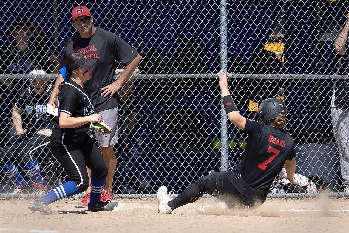 Courtesy photo
Coeur d'Alene's Abigail Linder (24) steps on third base to force out Moscow's Hannah Robertson (7) in the first game of a doubleheader Saturday at Larry Schwenke Field in Coeur d'Alene.