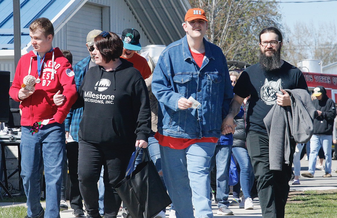 Many people with autism and their loved ones joined the Walk for Autism Acceptance Saturday.