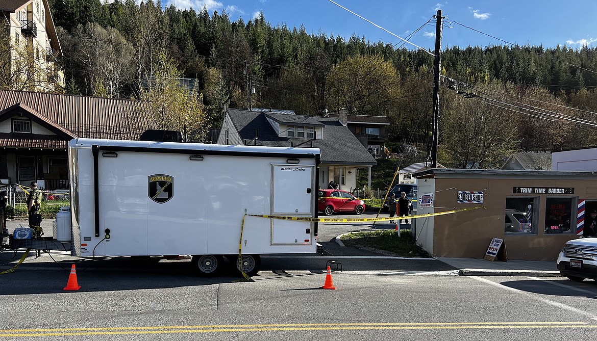 The body of a deceased male was found behind the building pictured on the right in uptown Kellogg on Monday afternoon. Idaho State Police brought their mobile crime lab (pictured) to assist in the investigation.