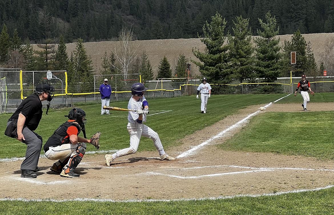 Kellogg's Reed Whatcott swings at a pitch during the Wildcats' sweep of Priest River last week.