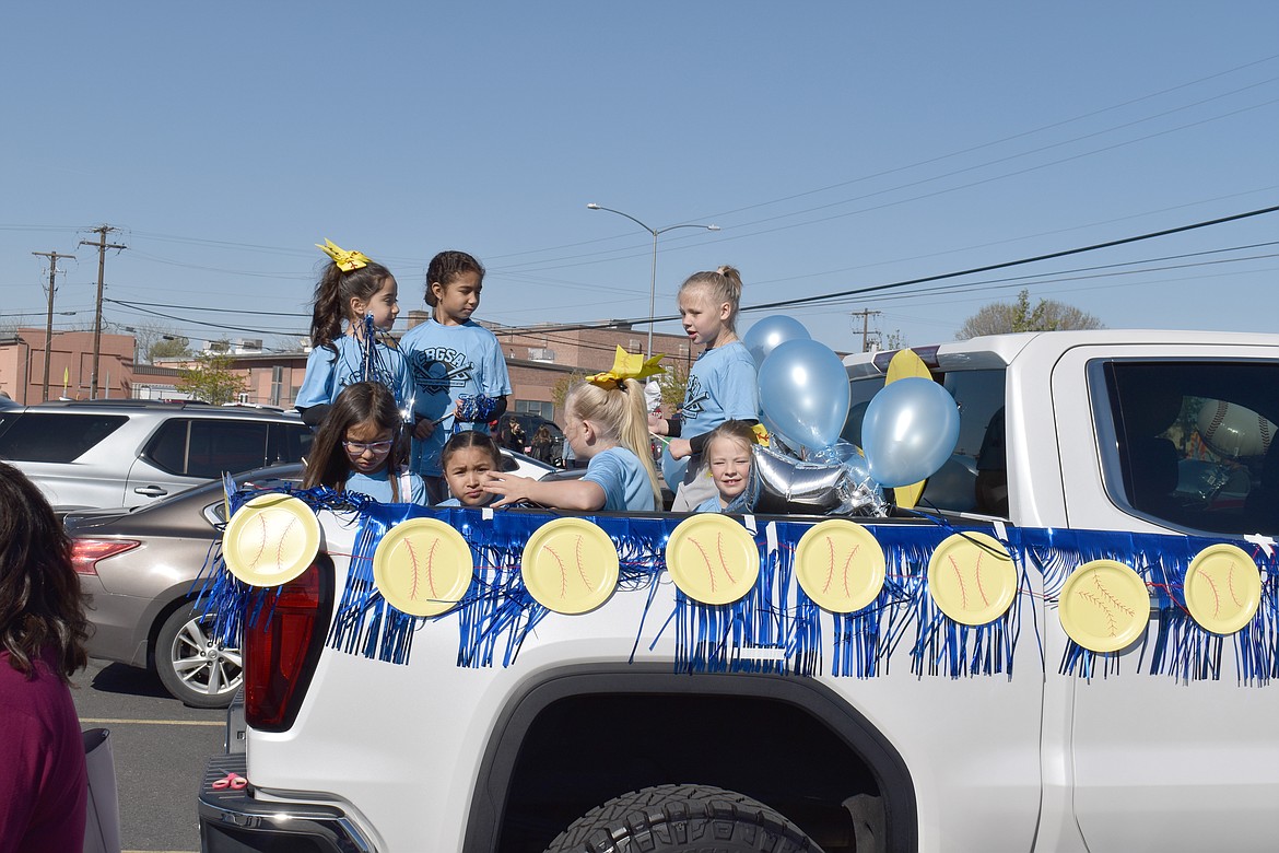 The 8U Sparks softball team gets ready to roll out for the annual Moses Lake Youth Parade Saturday morning. From left: Olivia Valdez, Viviani Guadarrama, Meliaa Piña, Addalynn Gutierrez, Maisee Leffett, Ivy Johnson, Abigail McKay.