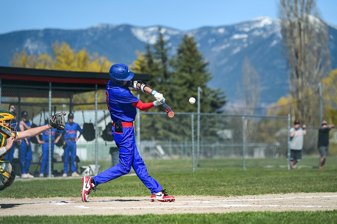 Bigfork's Hayden Mayer (8) connects against Whitefish at ABS Park in Evergreen on Tuesday, April 23. (Casey Kreider/Daily Inter Lake)