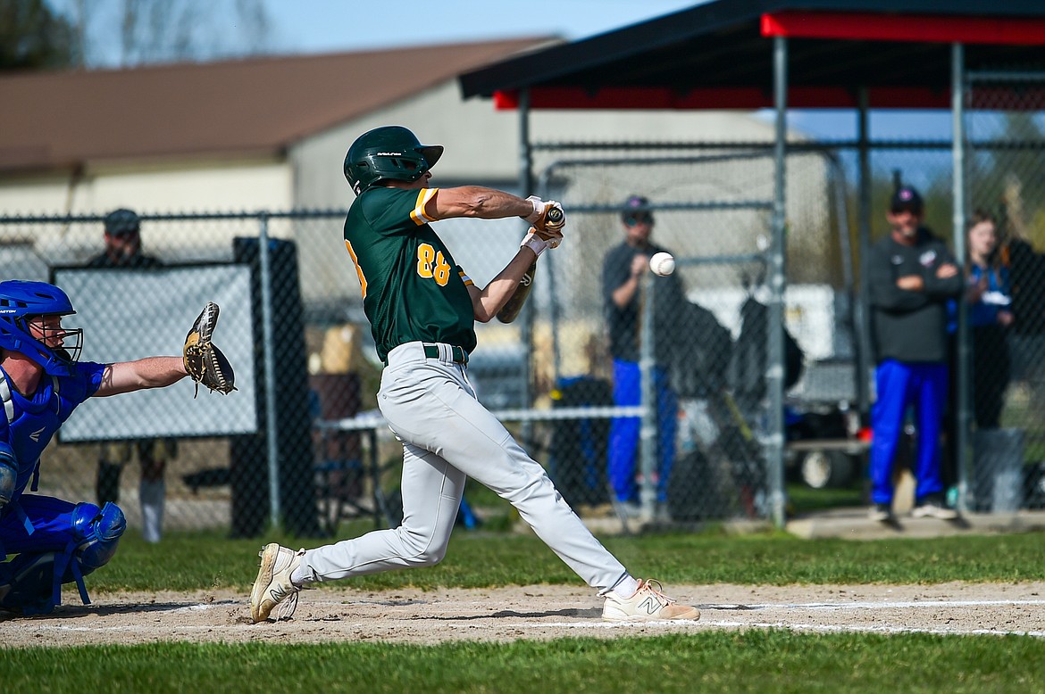 Whitefish's Brady Howke (88) connects on a double against Bigfork at ABS Park in Evergreen on Tuesday, April 23. (Casey Kreider/Daily Inter Lake)