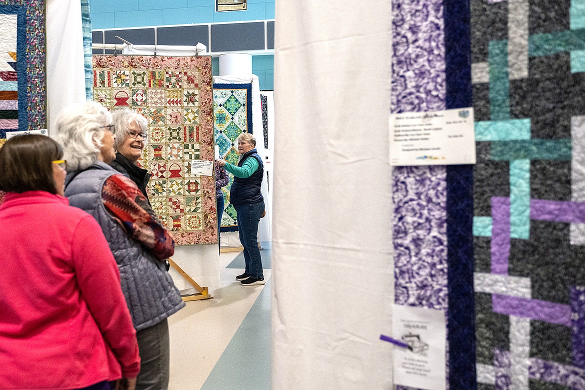 Spectators take in the Teakettle Quilt Show at Glacier Elementary School Saturday, April 20.