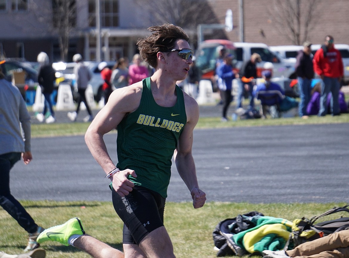 Junior Bulldog Riley Zetooney competes in the men’s 400 meter dash at the Columbia Falls Iceberg Invitational on Saturday. (Matt Weller photo)