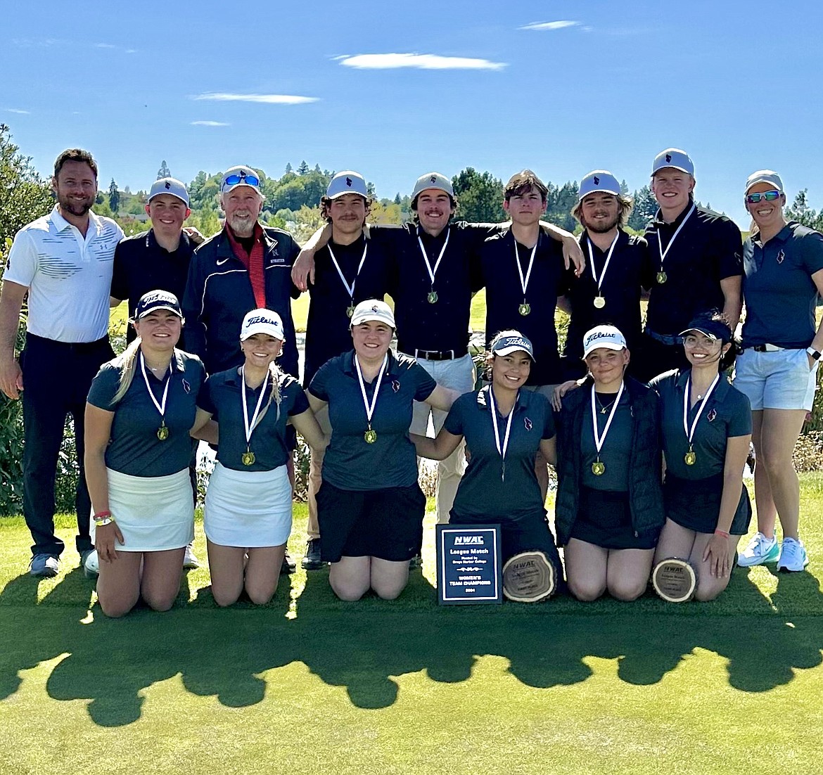 Courtesy photo
The North Idaho College men's and women's golf team captured team titles at the Grays Harbor Northwest Athletic Conference match on Tuesday at The Home Course in DuPont, Wash. In the back row, from left are head coach Russell Grove, Dyson Lish, volunteer coach Russ Grove, Jarret Giles, Josh McCartain, Spence Matson, Charlie Terwilliger, Quinn Abbott and assistant golf coach Brittany Pounds. In the front are Ava Young, Rien Solodan, Sofia Lippiello, Laila Jalil, Megan Quinton and Lauryn Bulger.