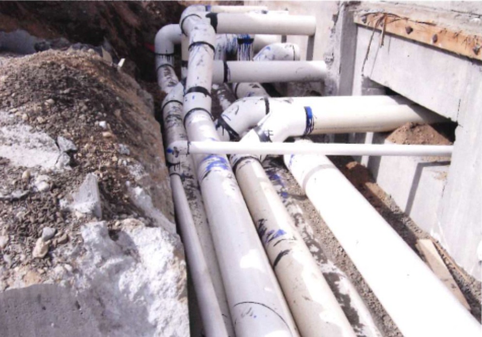 A photo from during the Othello Community Pool’s construction in 2007 shows pipes that were installed incorrectly, without bedding beneath or between the pipes, according to Othello Public Works Director Curt Carpenter.