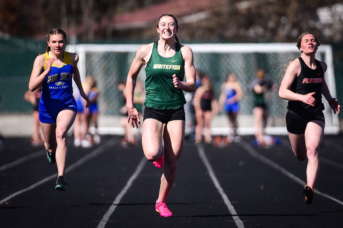 WHITEFISH'S BROOKE ZETOONEY sprints to a first-place finish in the girls 100 meters in a triangular meet held last April at Legends Stadium in Kalispell. The senior is the three time State A champion in that event. (Casey Kreider/Daily Inter Lake)