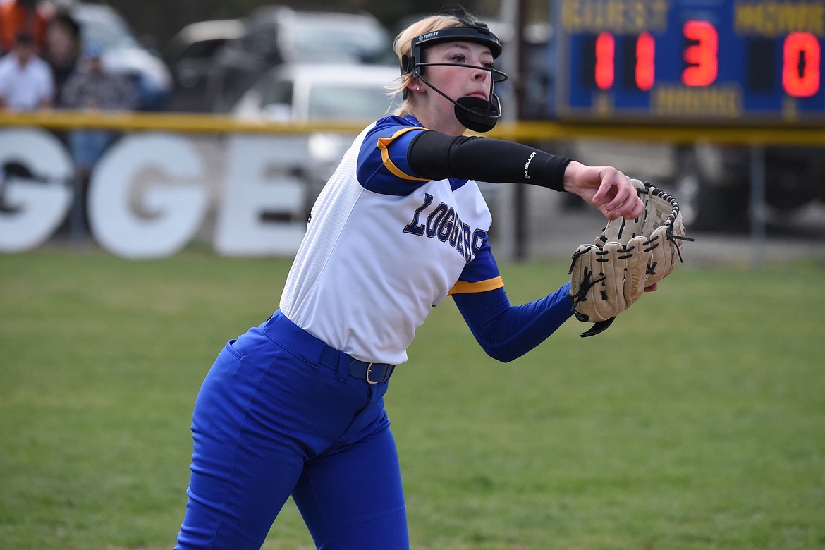 Libby softball player Rachel Kosters follows through after making a throw to first base on April 18 against Columbia Falls. (Scott Shindledecker/The Western News)
