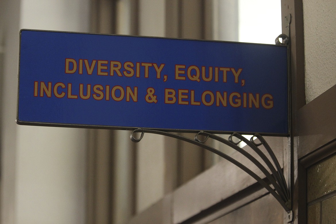 The sign above the door to the Office of Diversity, Equity, Inclusion and Belonging inside the main administration building on the main University of Kansas campus is seen on Friday, April 12, 2024, in Lawrence, Kan. A conservative quest to limit diversity, equity and inclusion initiatives is gaining momentum in state capitals and college governing boards, with officials in about one-third of the states now taking some sort of action against it. (AP Photo/John Hanna, File)