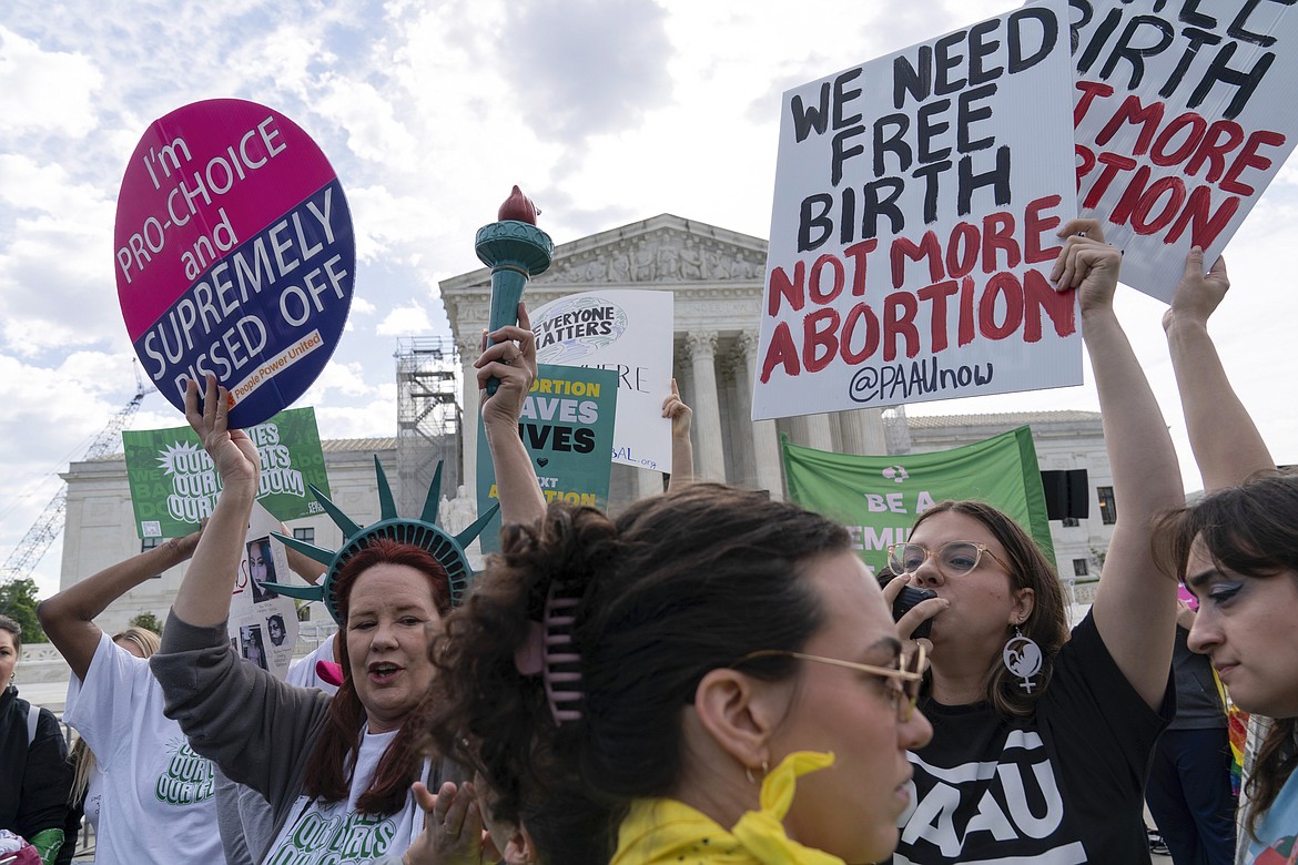 Anti-Abortion and Abortion-rights activists rally outside the Supreme Court, Wednesday, April 24, 2024, in Washington. (AP Photo/Jose Luis Magana)