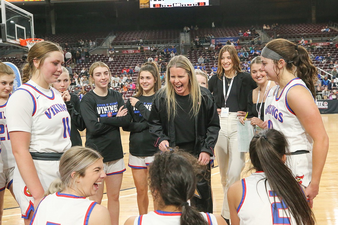 JASON DUCHOW PHOTOGRAPHY
Coeur d'Alene coach Nicole Symons and the Vikings share a happy moment during the 2023 state 5A girls basketball championship game at the Ford Idaho Center in Nampa. After five season as head coach, Symons stepped down on Wednesday afternoon.