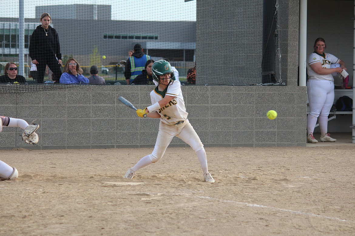 Quincy’s Myka Hinojosa swings at the pitch in Tuesday’s doubleheader against Ephrata.