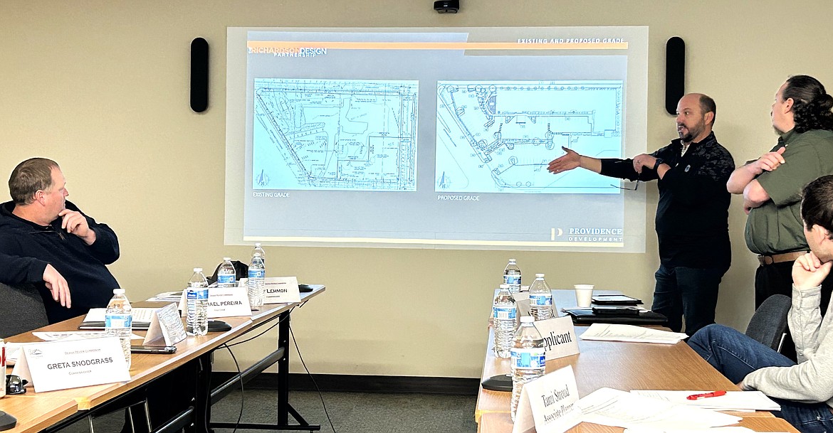 Drew Dittman with Lake City Engineering explains plans for a Marriott hotel on Northwest Boulevard during a Design Review Commission hearing at City Hall on Thursday.